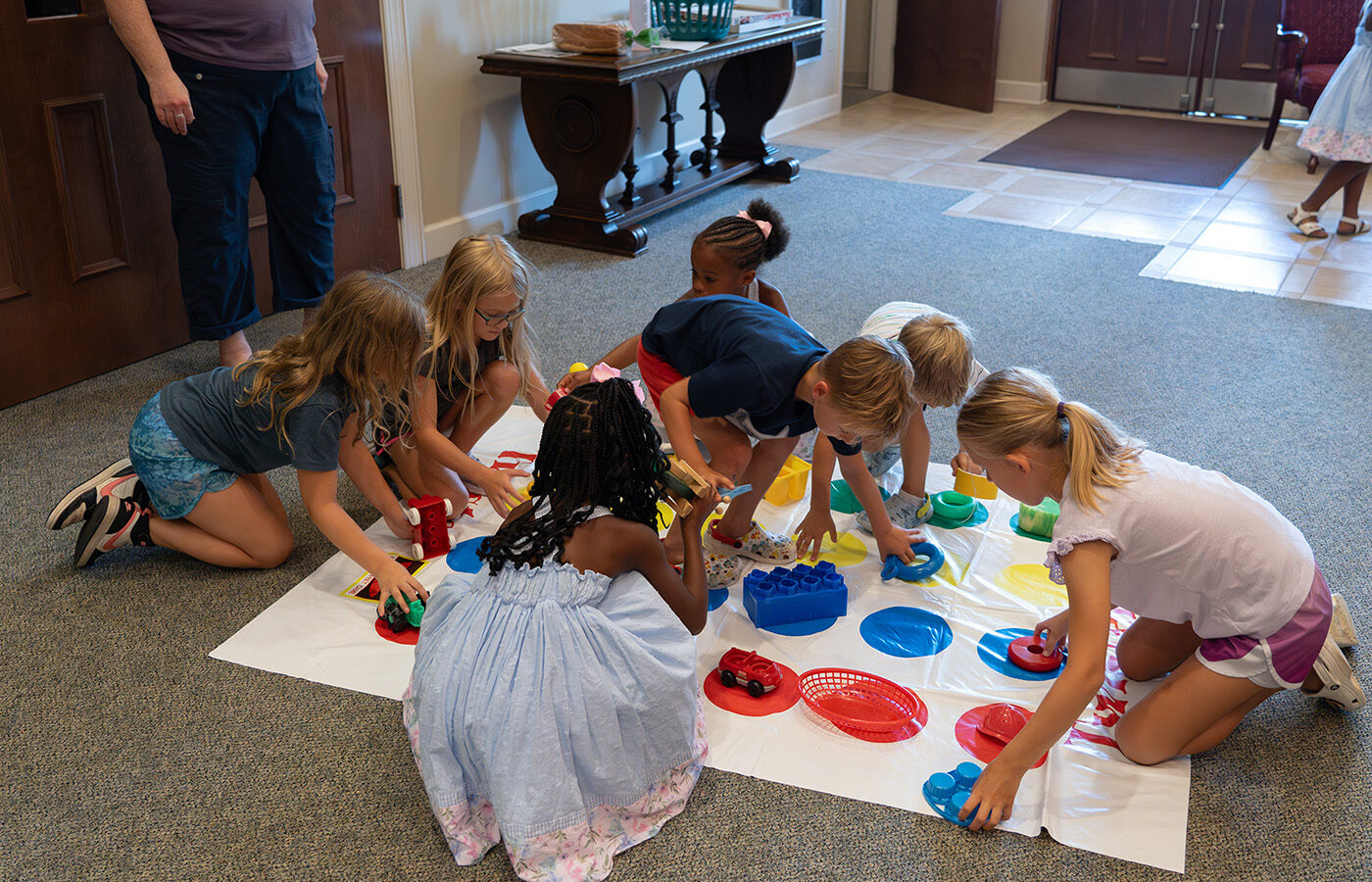 Group playing Twister (web)